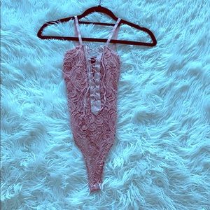 Beautiful baby pink lace bodysuit